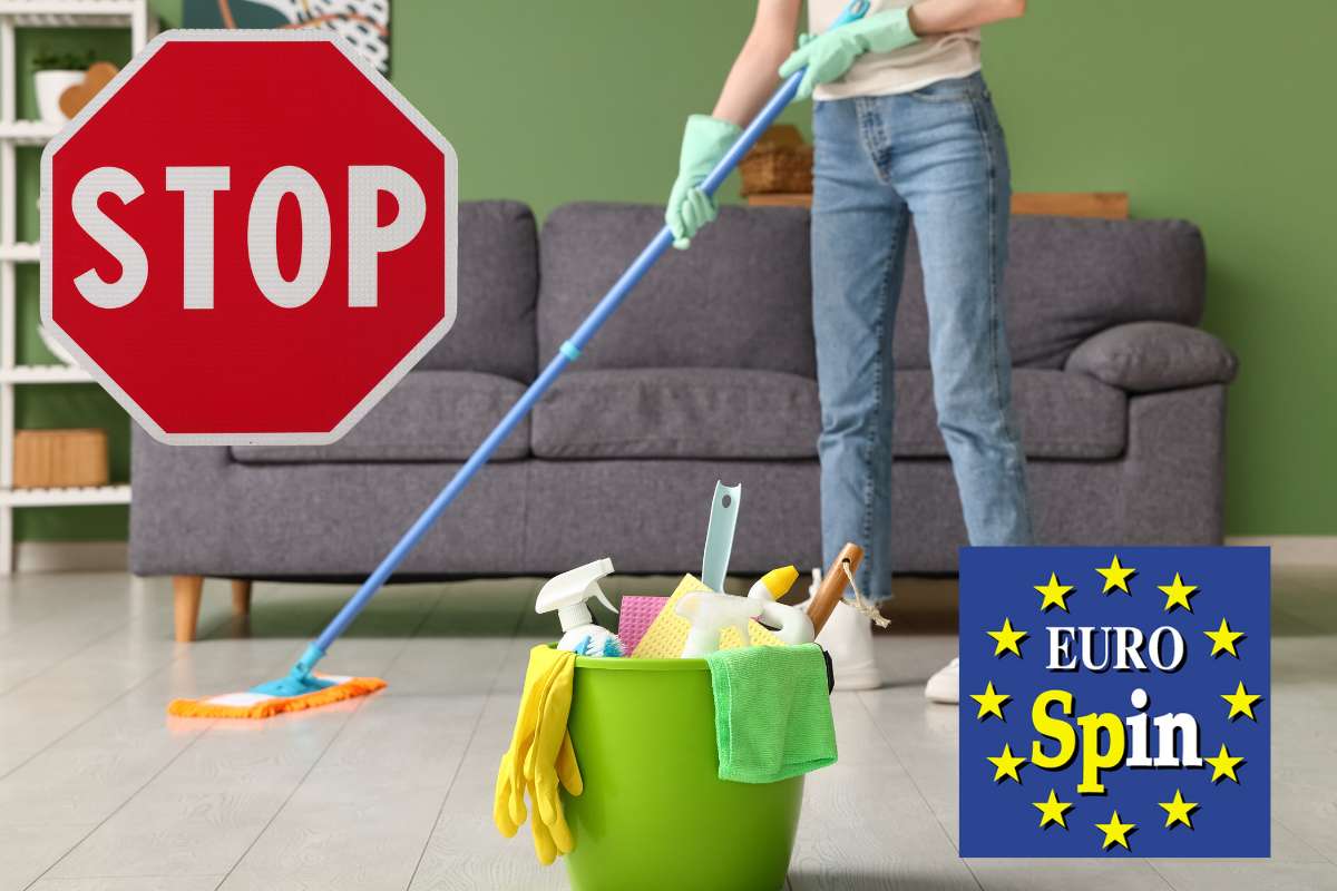 donna che pulisce a terra segnale stop e logo eurospin