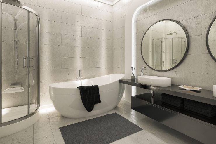 Un bagno moderno con un lavandino sospeso