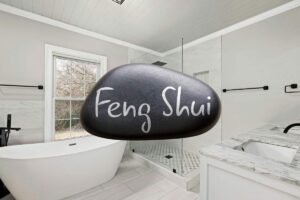 bagno e pietra al centro con scritto feng shui