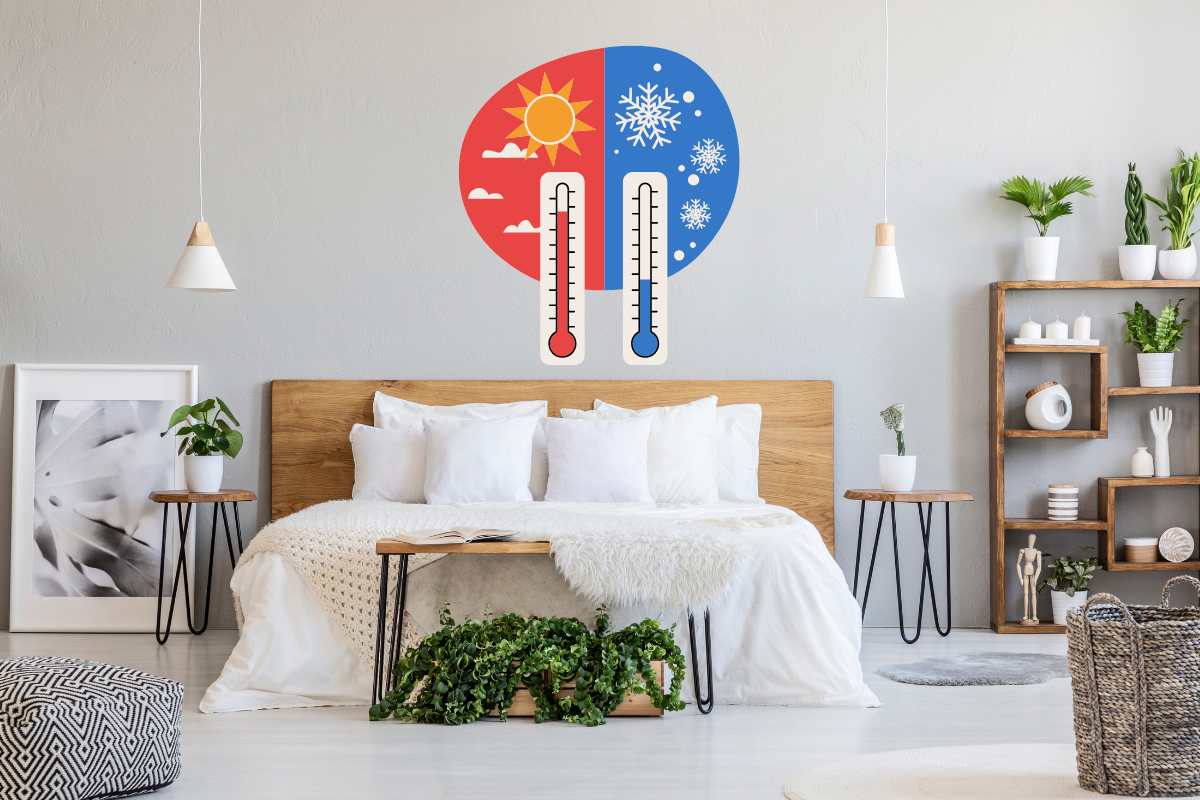 Una stanza da letto con sopra due termometri che segnano uno una temperatura calda ed una fredda