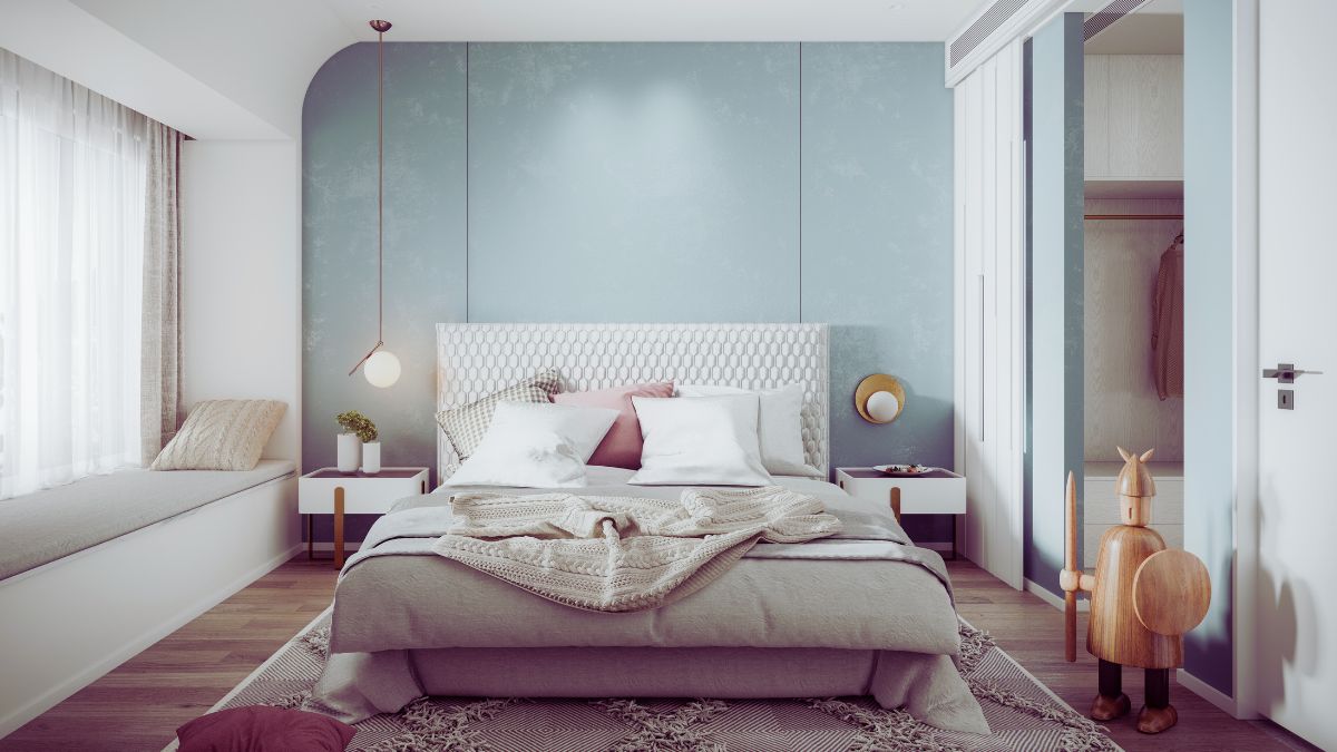 camera da letto con parete celeste