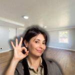 casa luminosa e donna che fa ok