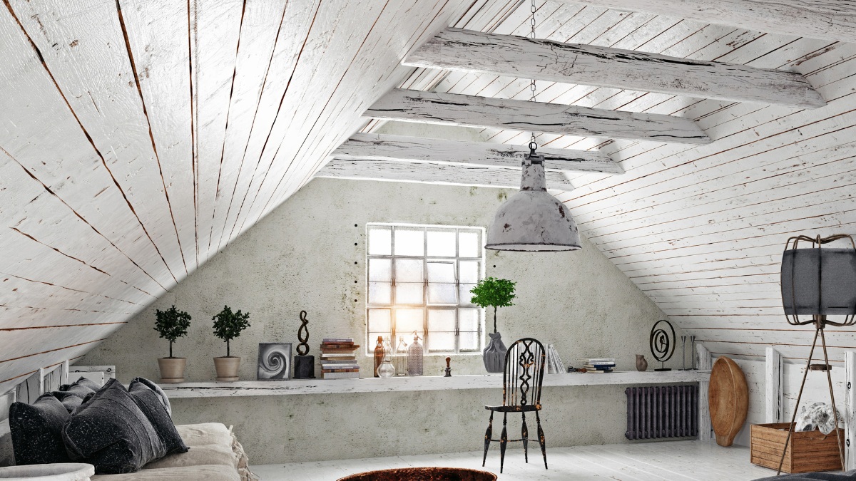 sottotetto bianco con mobili 