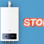 Scaldabagno attaccato ed accanto una scritta di stop