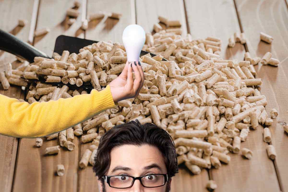 pellet e mano con lampadina con uomo con idea