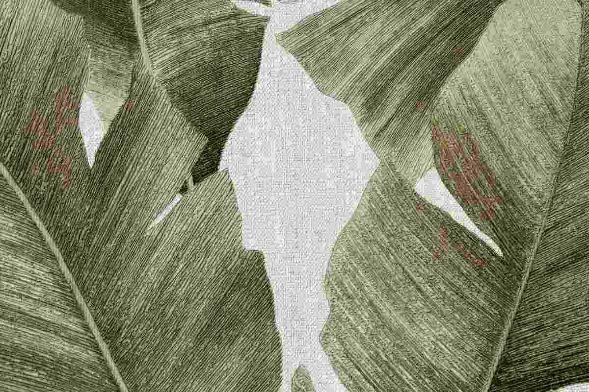 foglie enormi e verdi di piante su carta da parati 