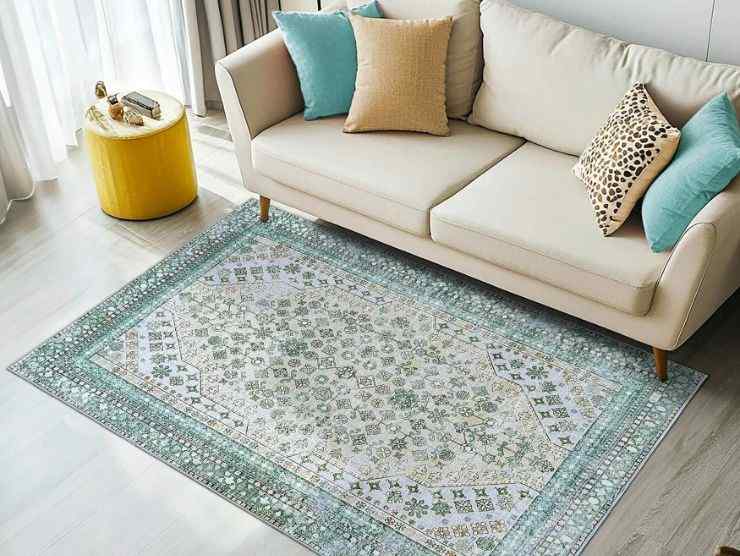 soggiorno moderno con divano bianco e tappeto sistemato davanti