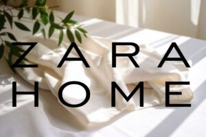 tovaglia bianca sullo sfondo e scritta zara home