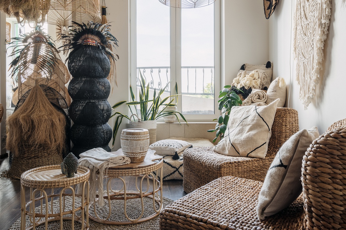 Rattan,Armchair,With,Cushions,Near,Bamboo,Coffee,Table,In,Bright