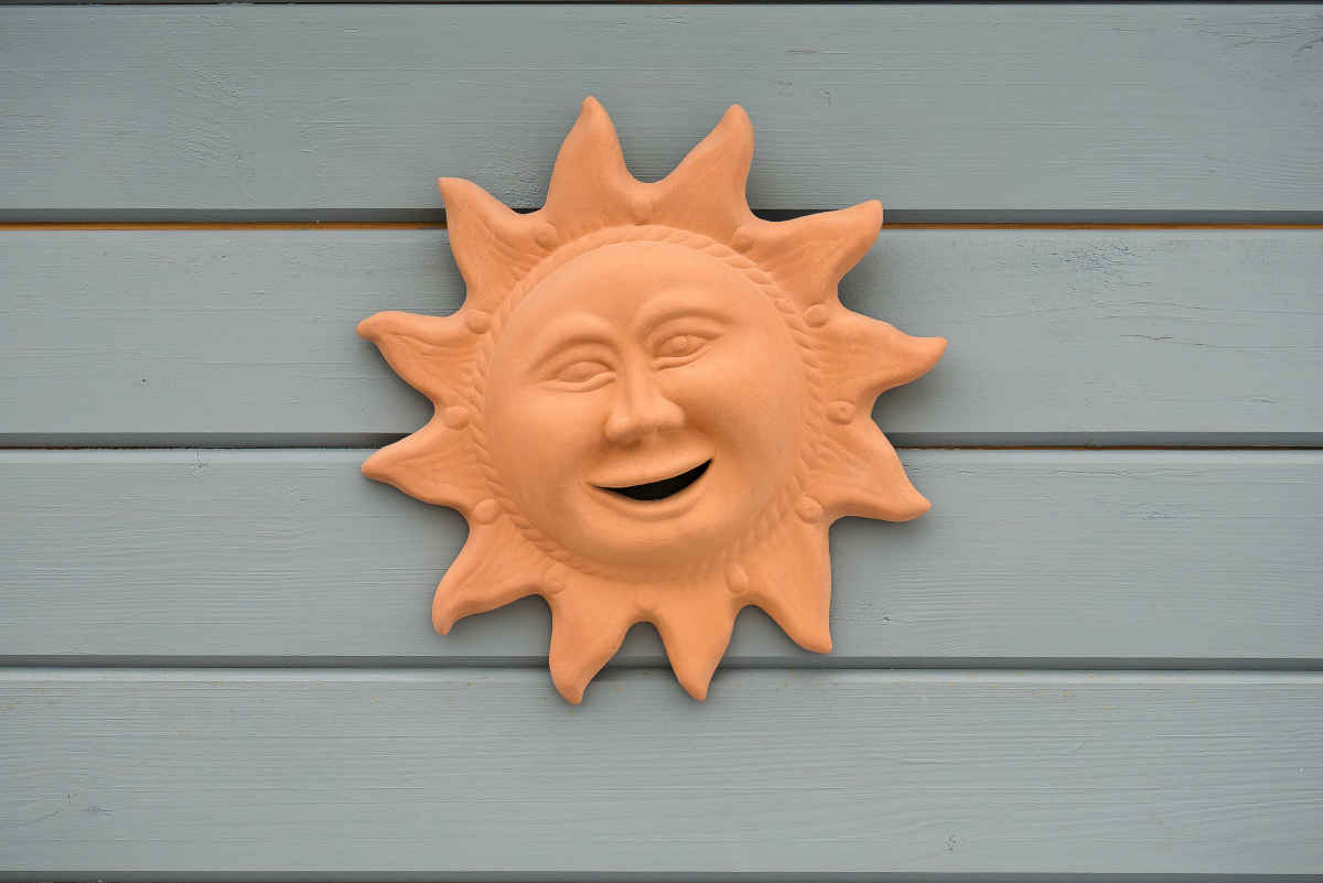 scultura in terracotta da appendere